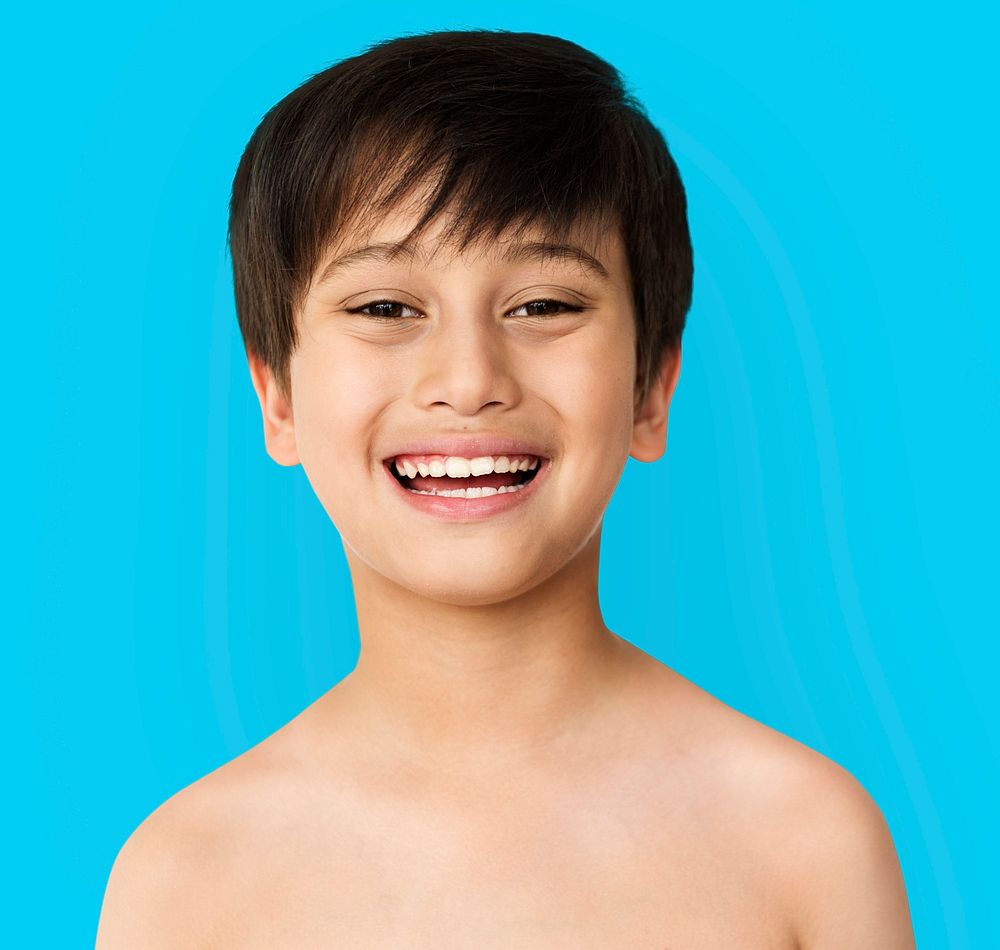 Little Boy Smiling Face Expression Topless Studio Portrait