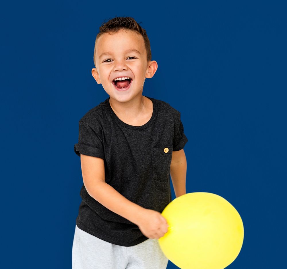 Little Boy with Yellow Balloon Studio Portrait