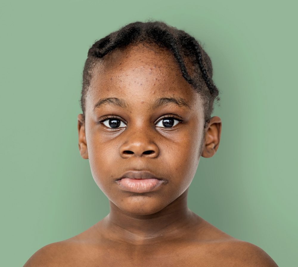 African kid portrait shoot with staring face