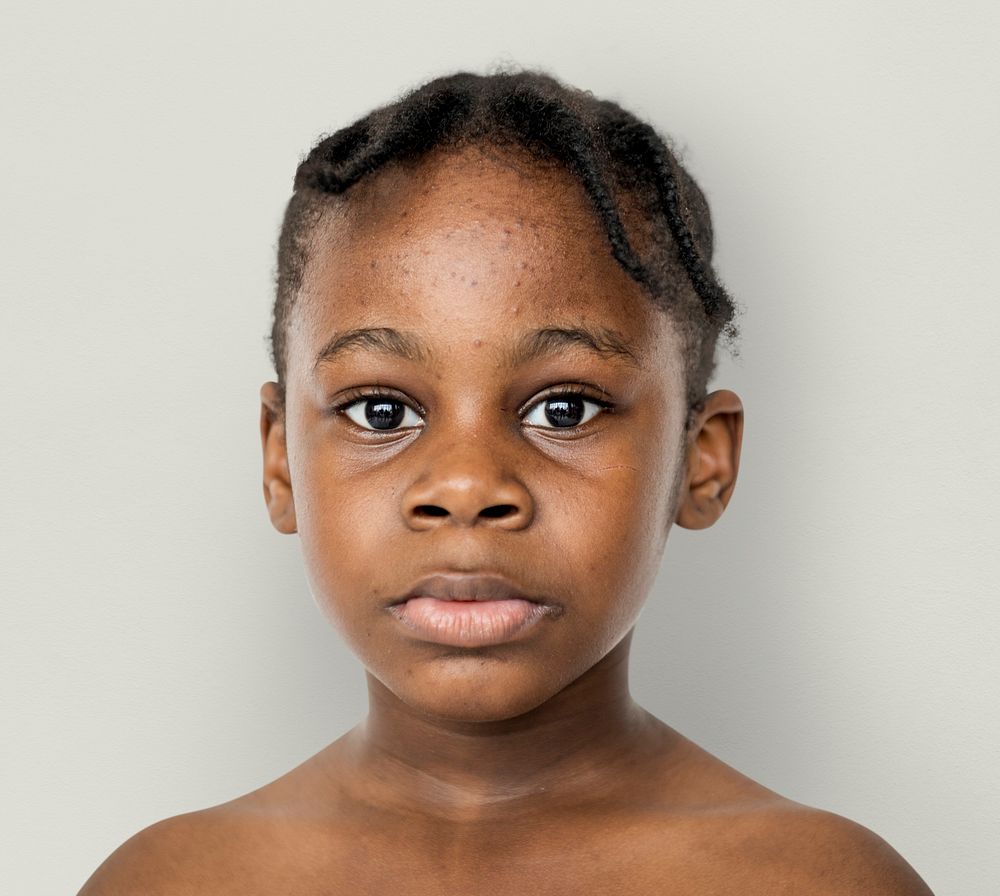 African kid portrait shoot with staring face