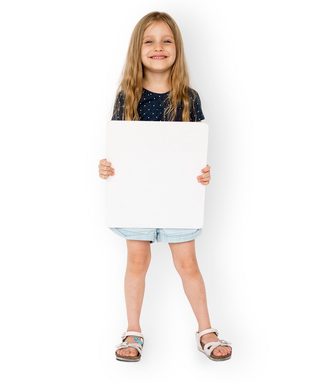 Little girl smiling and holding blank placard