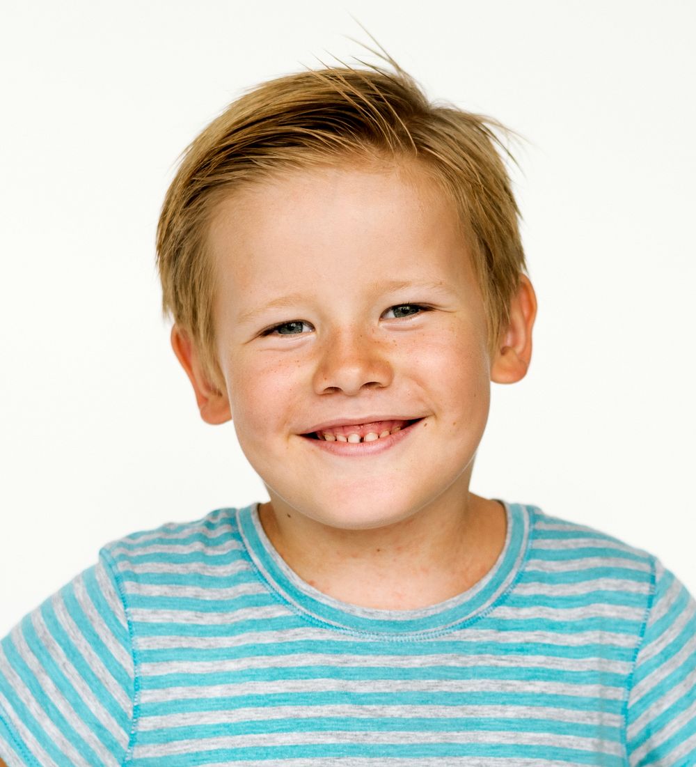 Portrait of a happy boy on white background