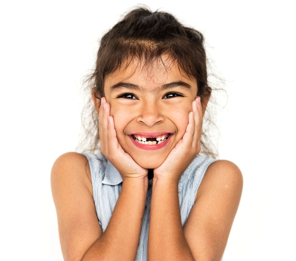 Portrait of Happy little girl smiling on white background
