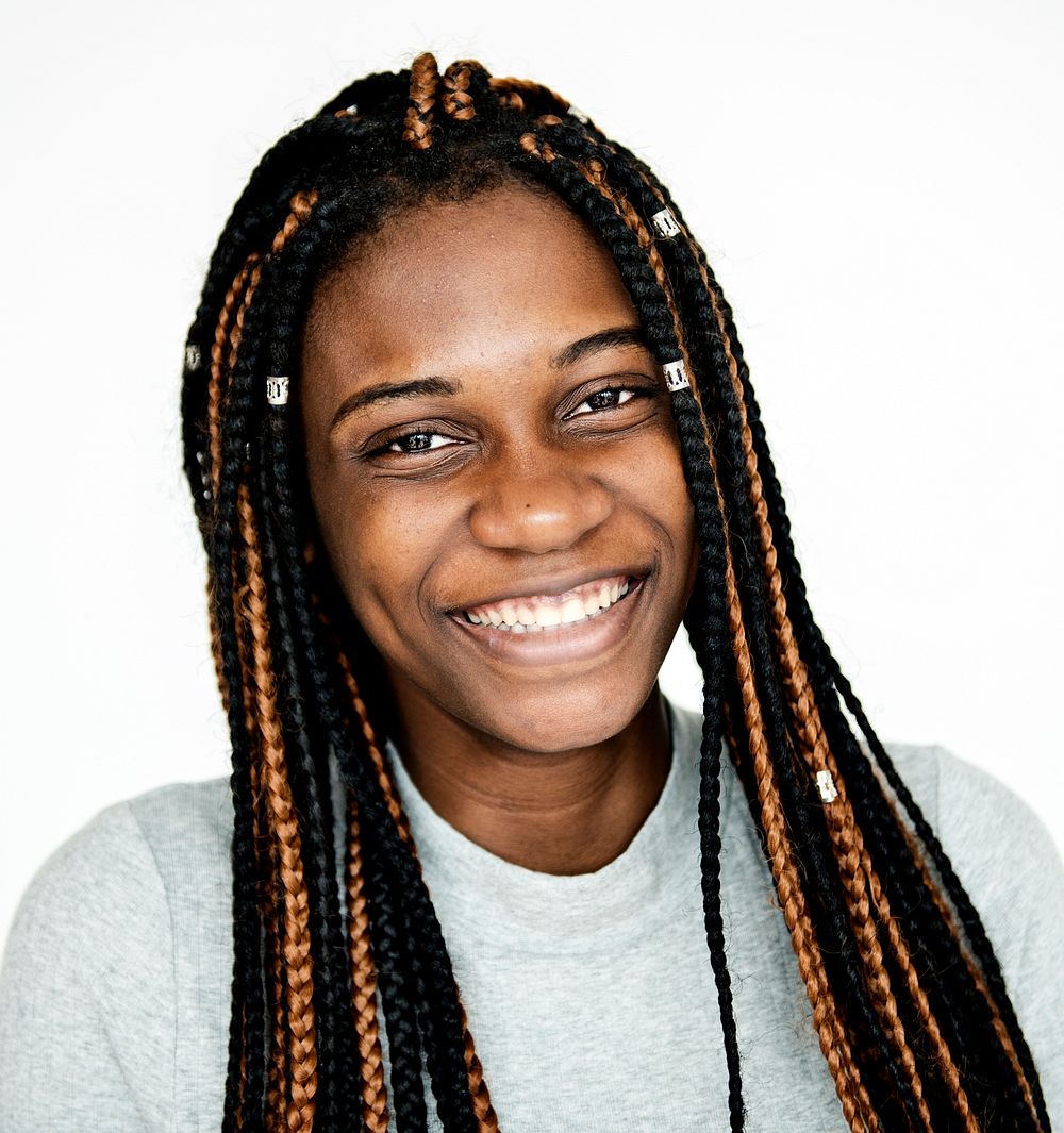 Young adult girl smiling studio portrait