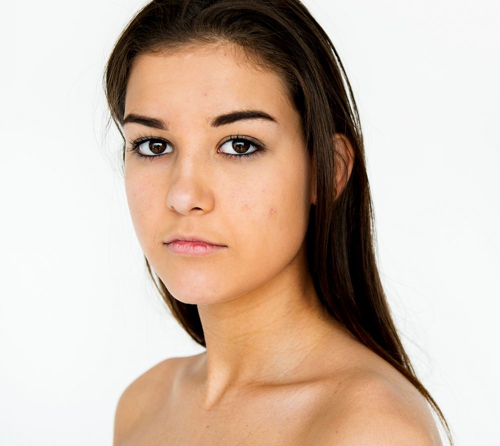 Young Adult Woman Topless with Serene Face Expression Studio Portrait
