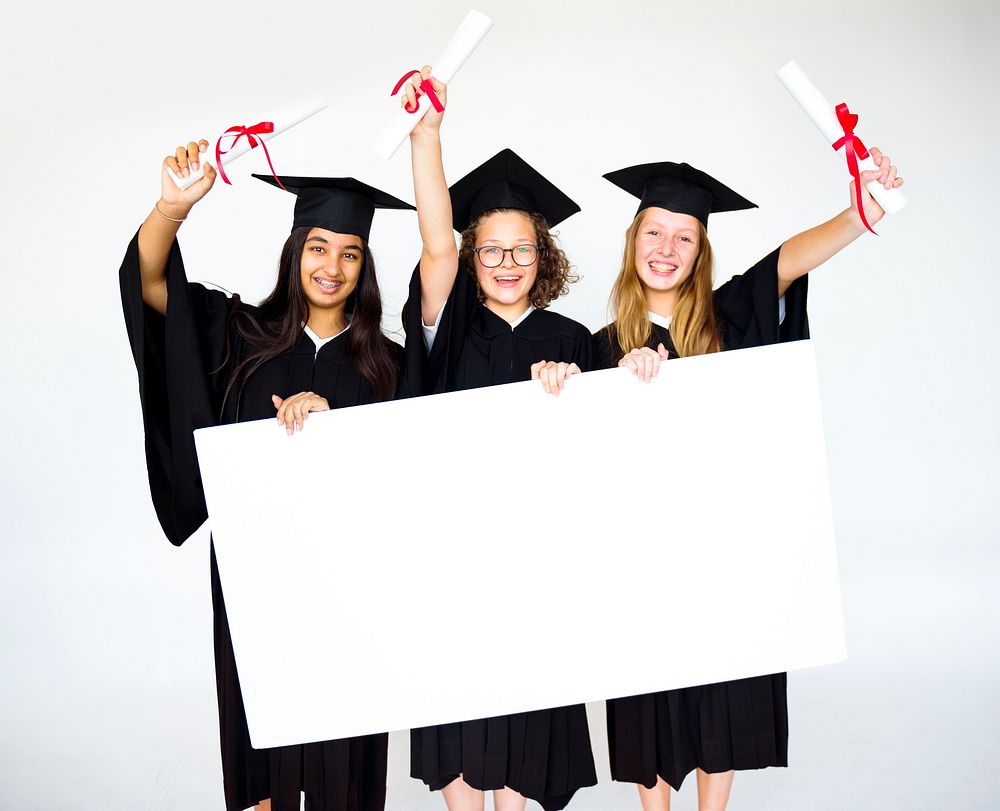 Happiness group of graduated students celebration with blank banner