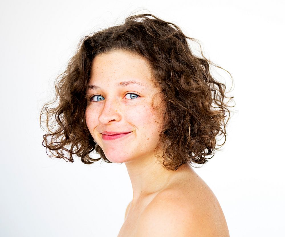 Woman bare chest topless smiling studio portrait