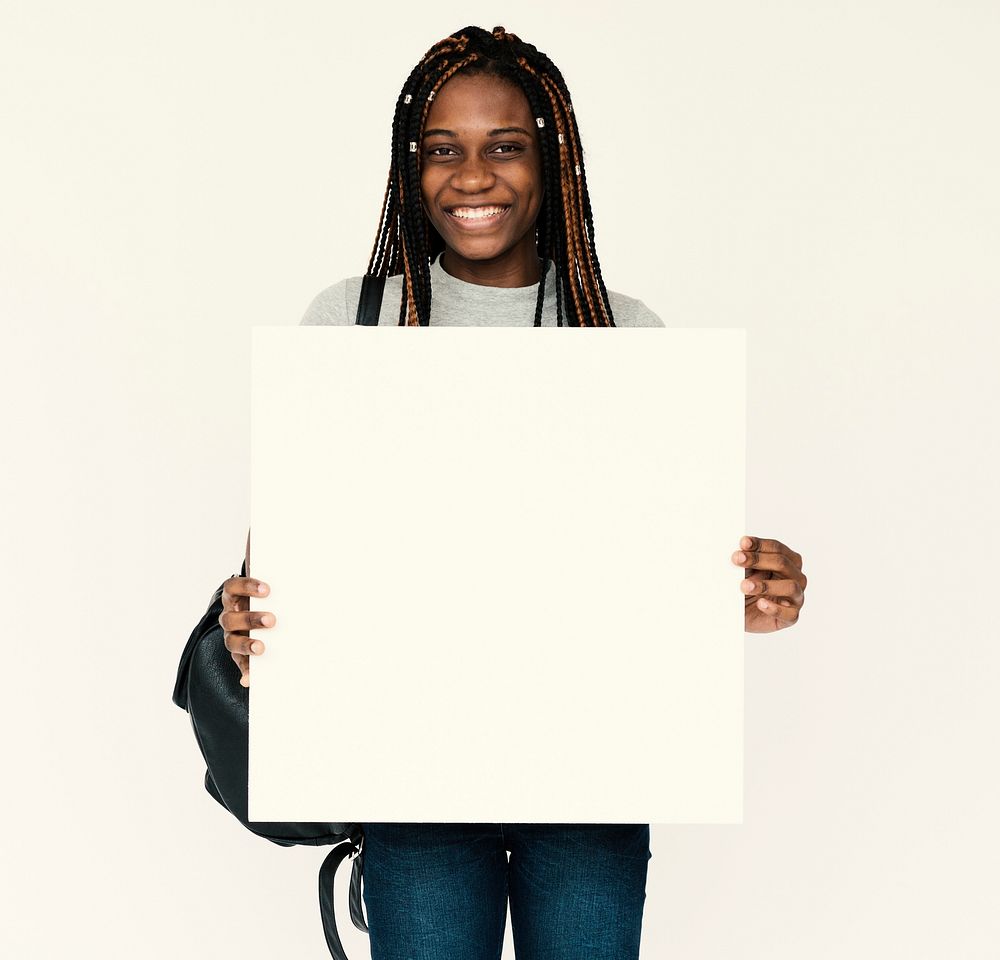African woman holding empty for advertising