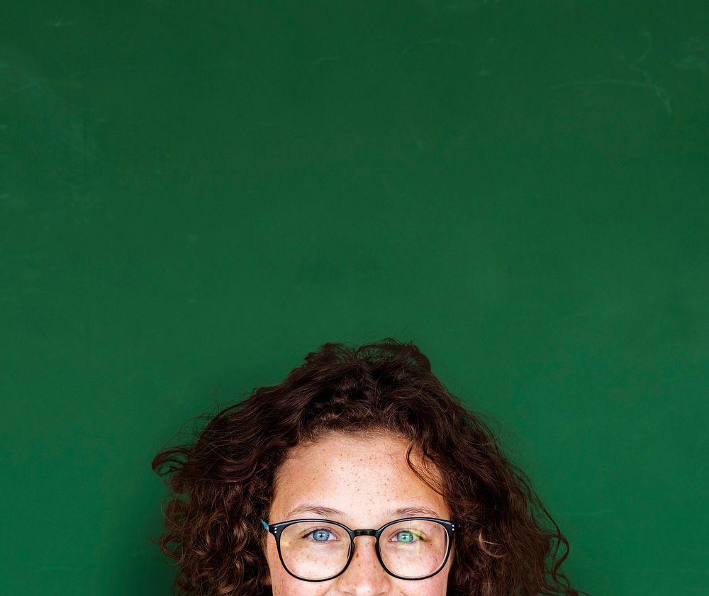 Girl with curly hair and glasses