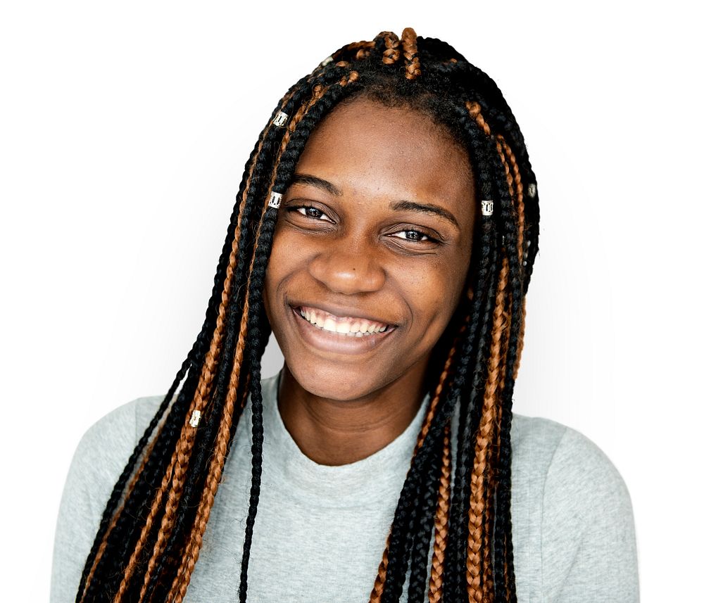 Young african descent girl with dreadlocks smiling