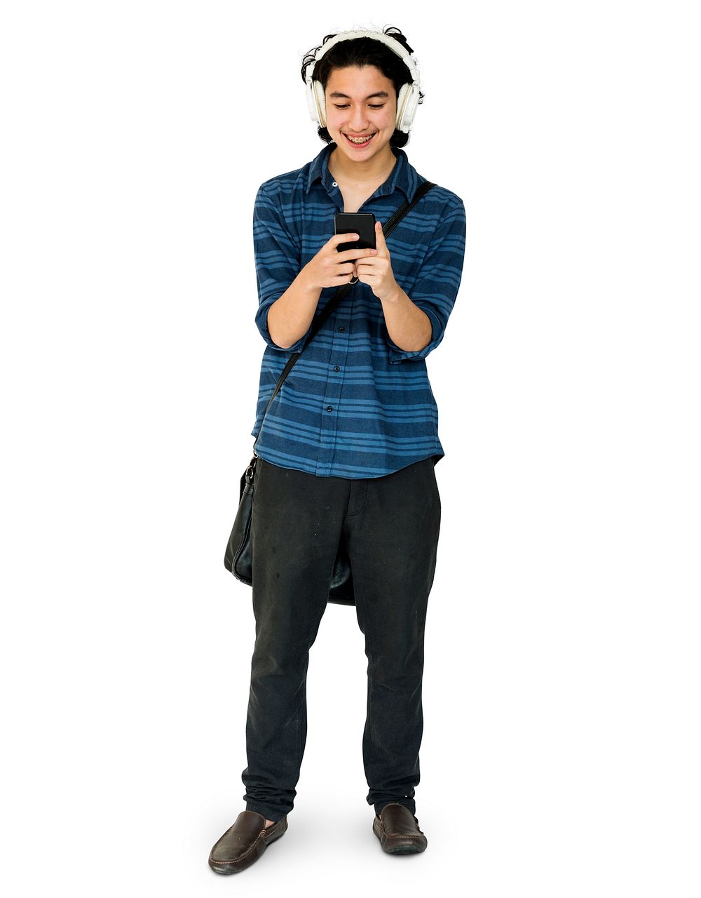 Young man full boady listening music on smart phone
