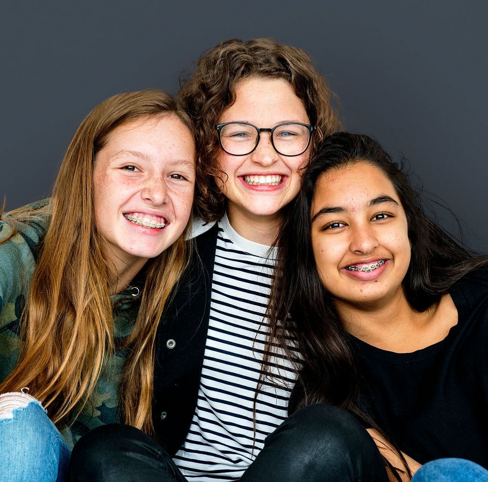 Diverse Young Adult Women Friendship Together Studio Portrait