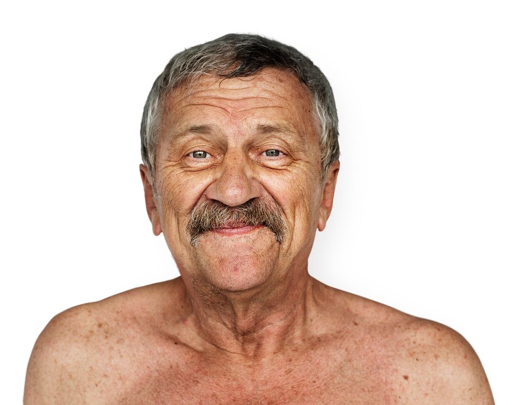 Senior man shirtless looking at camera studio shoot