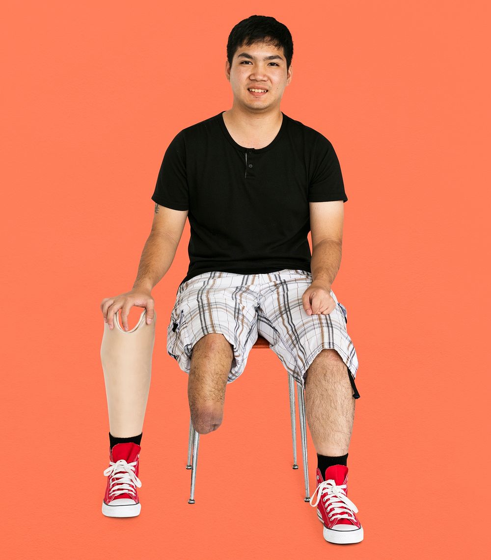Disability Young Man with Prosthesis Leg Studio Portrait