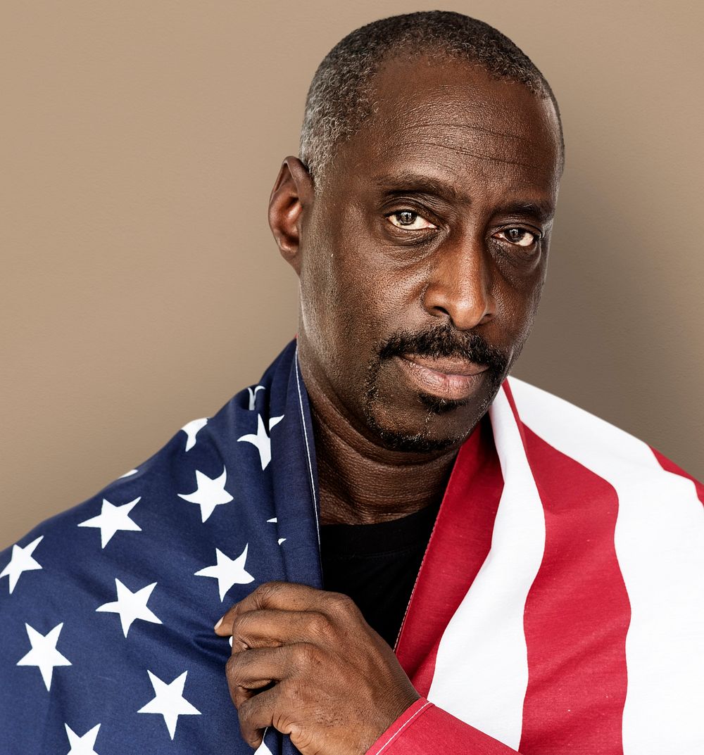 Adult Man Covered with American Flag Nationality Studio Portrait