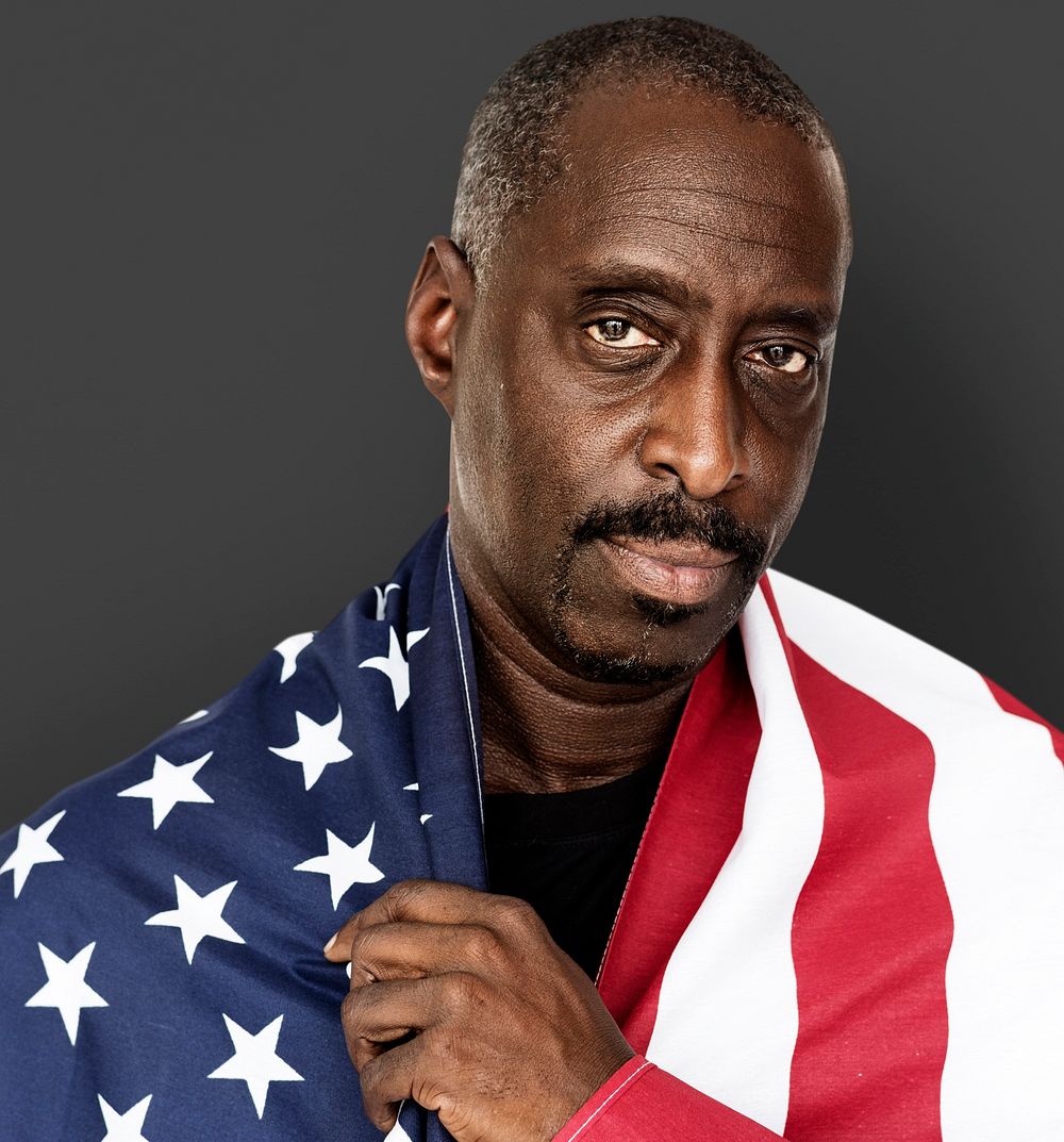 Adult Man Covered with American Flag Nationality Studio Portrait