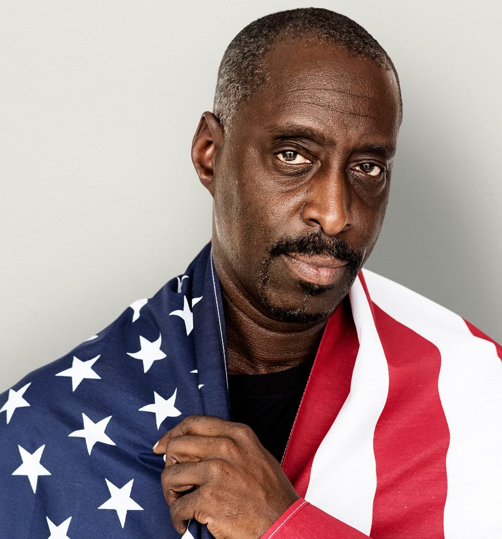Adult Man Covered with American Flag Nationality Studio Portrait