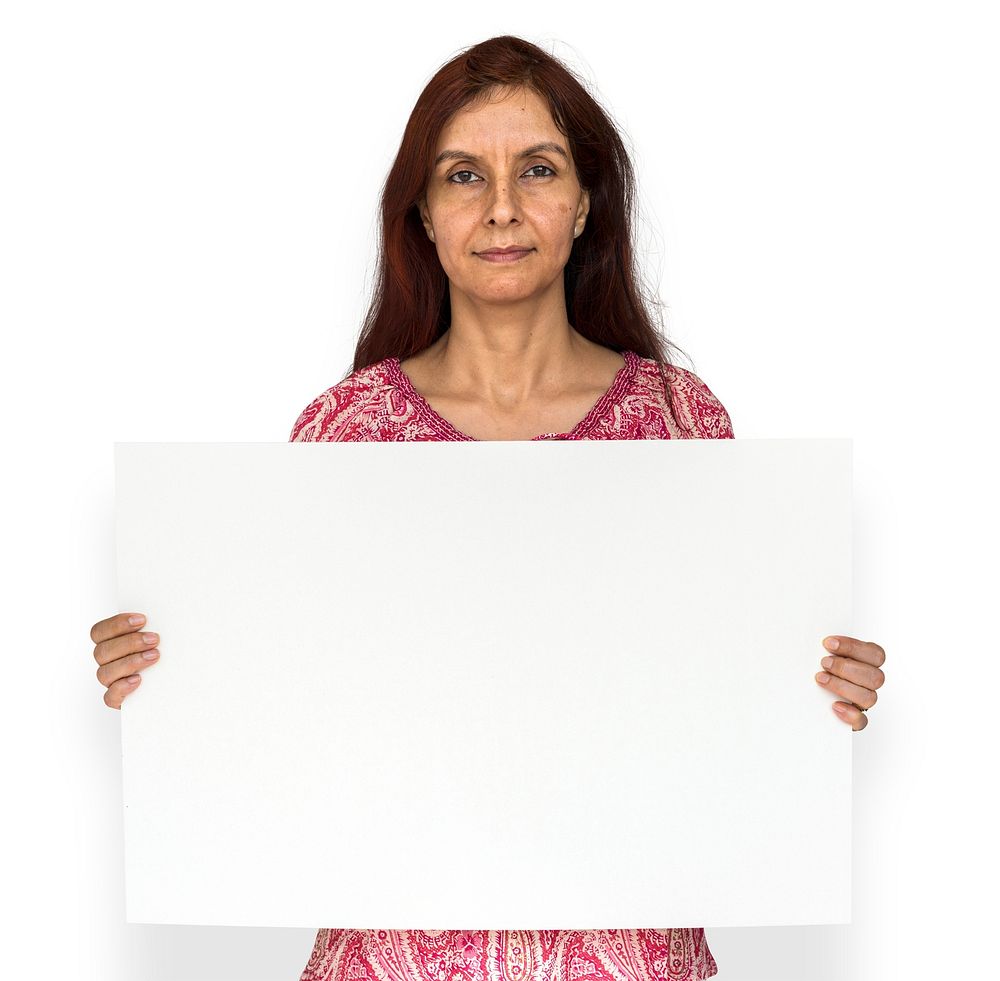 Indian woman is holding a placard