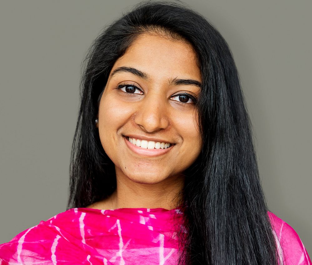 Young woman smiling studio photo