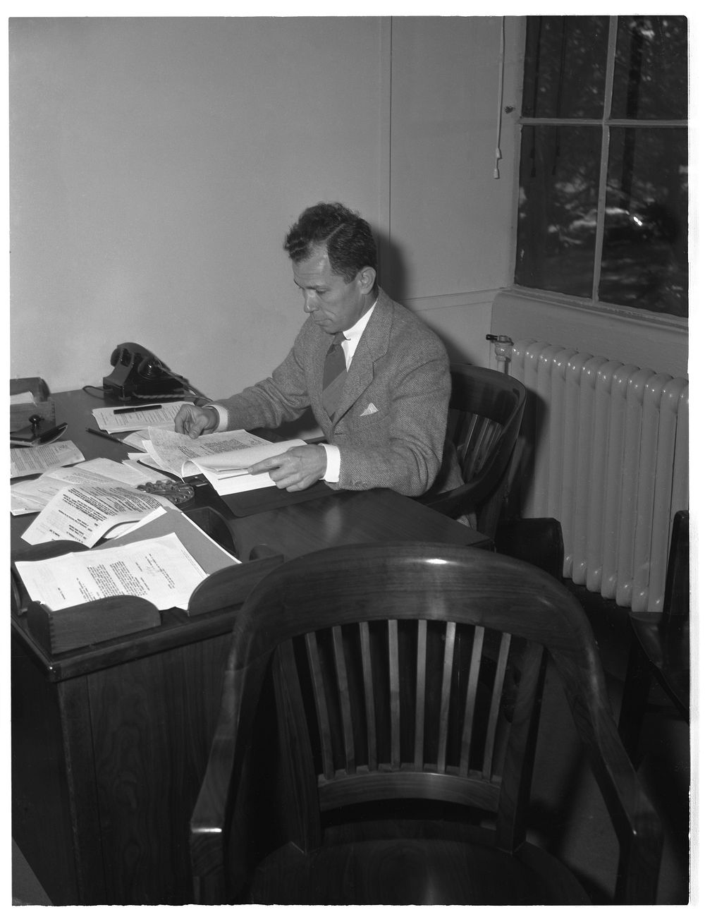 W.L. Finger, chief consultant, rubber unit, Materials Branch, Production Division. Sourced from the Library of Congress.