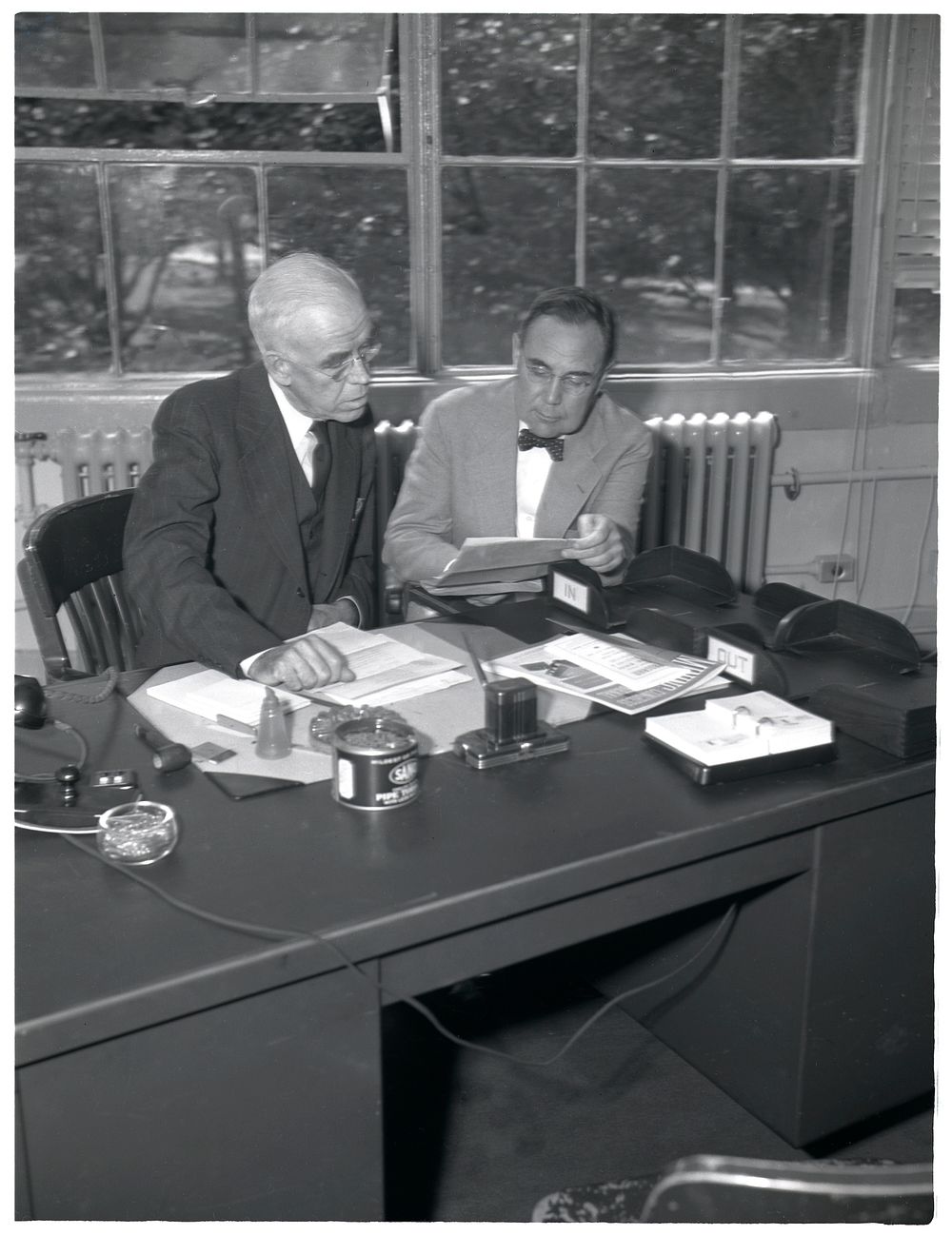 R.C. Allen, Consultant, Ferrous Mineral and Alloys Production Division (right), and Dr. C.K. Leith, Consultant on Minerals…