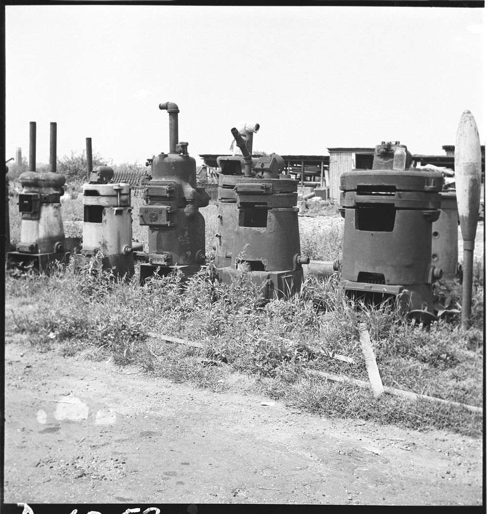 Conservation. Scrap iron and steel. This gaunt row of discarded boilers represent a potential source of tons of steel for…