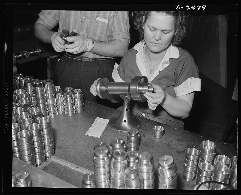 To save time in checking threads on a twenty-millimeter shell booster, a plant superintendant built this machine. It makes…