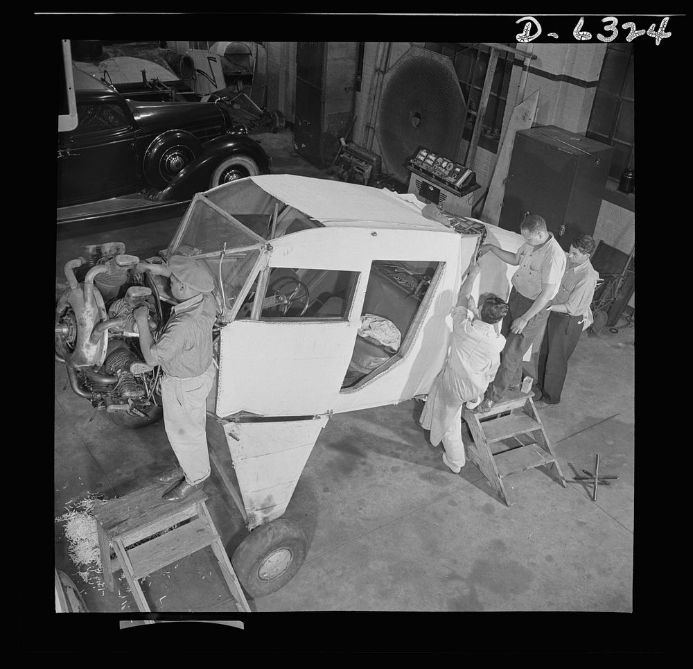 Training. Work Projects Administration (WPA) vocational school. This small cabin plane is being completely overhauled by…