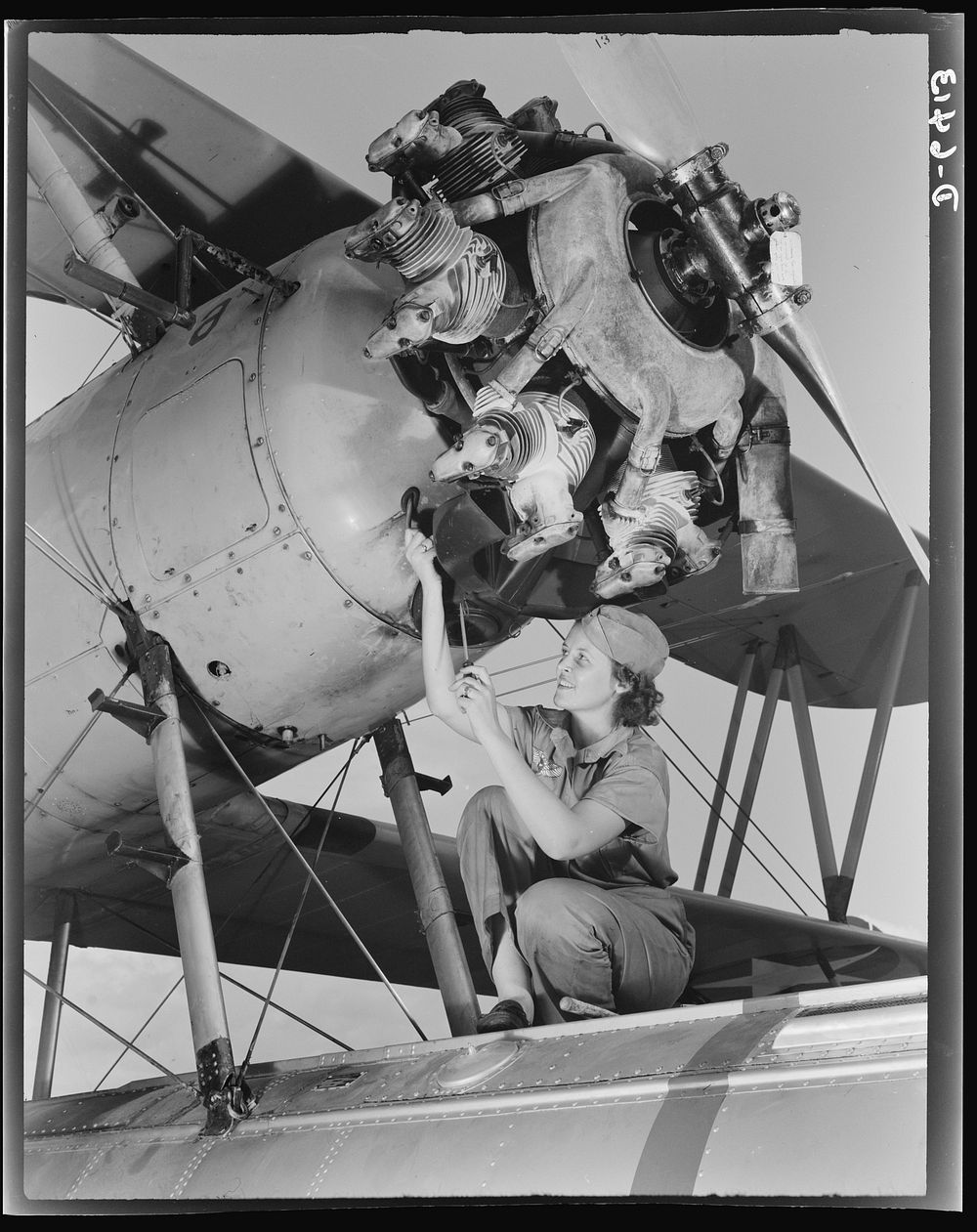 Naval air base Corpus Christi, Texas. A top-notch mechanic, Mary Josephine Farley, expertly rebuilds airplane engines.…