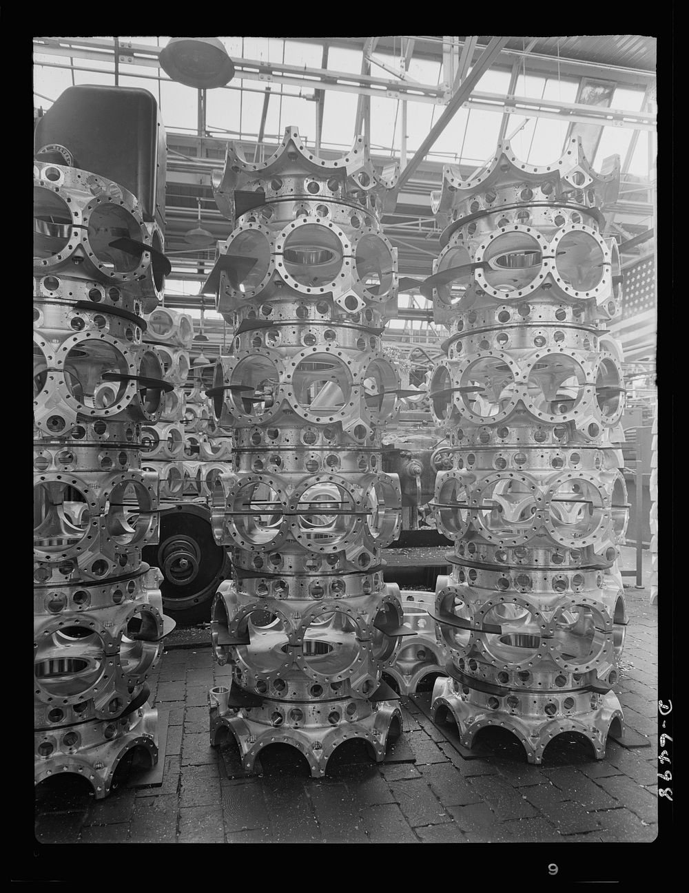 Production. Pratt and Whitney airplane engines. Single-row power cases for Pratt and Whitney airplane engines are stored for…