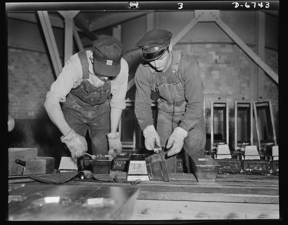 Production. Tin smelting. "Bars" of pure tin are trimmed and cleaned before removal from the molds in which they were formed…