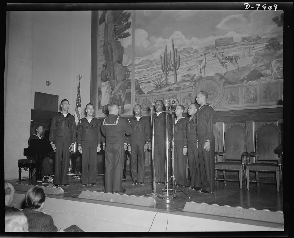 Marian Anderson mural dedicated. Musician (second class) Wayman E. Hathcock, directs a double quartet from Camp Robert…
