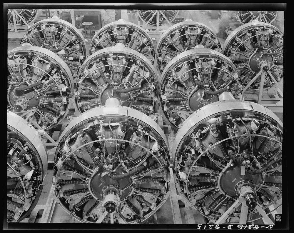 Production. B-17 heavy bomber. 1200-horsepower Wright engines for B-17F (Flying Fortress) bombers ready for installation on…