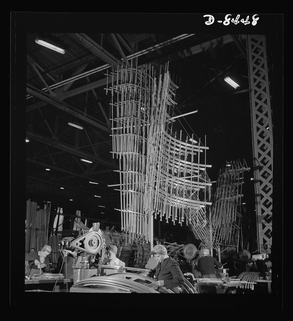 Production. B-17 heavy bomber. Sections of frameworks for B-17F (Flying Fortress) bomber fuselages at the Boeing plant in…