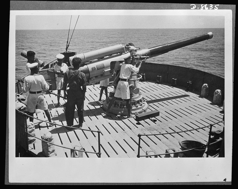 India in the war. On duty with seamen of the Royal Indian Navy on active service in Eastern waters. Captured Italian…