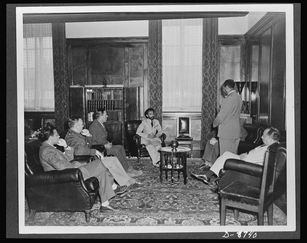 American military delegation calling on Haile Selassie. In conference with the American delegation. Left to right: F. N.…