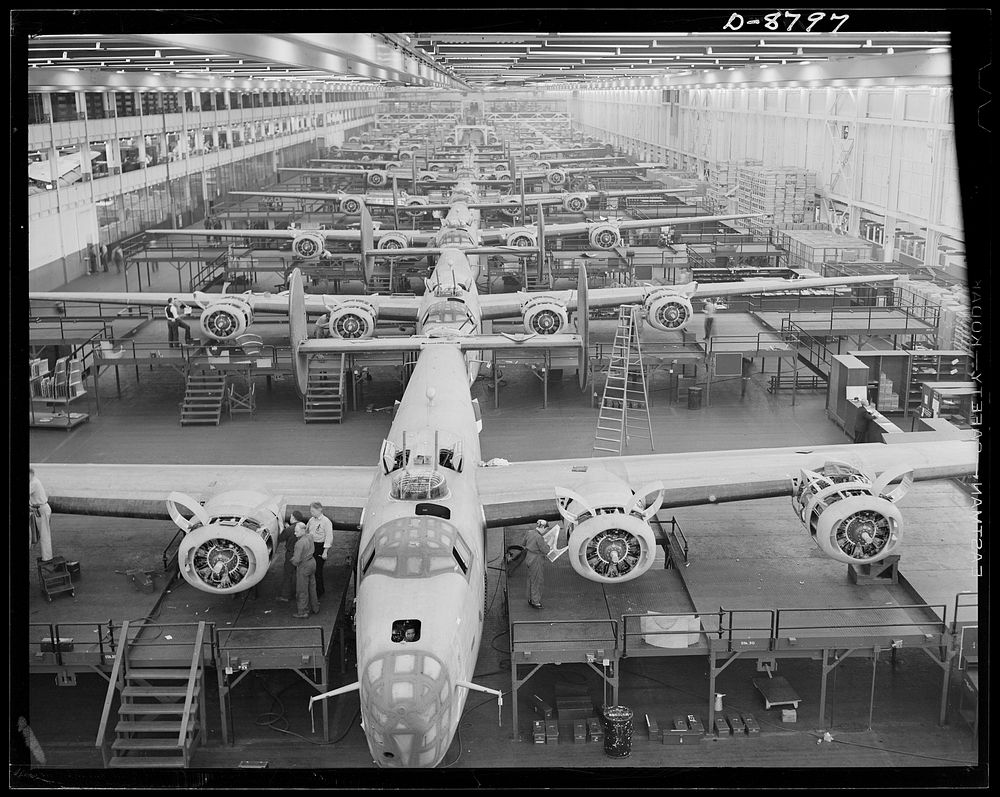 Production. B-24E (Liberator) bombers at Willow Run. Looking up one of the assembly lines at Ford's big Willow Run plant…