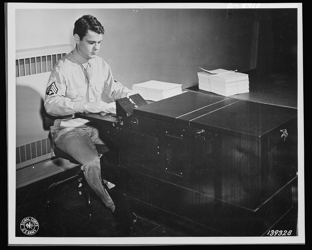 V-mail. Letters to members of the armed forces overseas are photographed on V-mail microfilm at the Pentagon building…