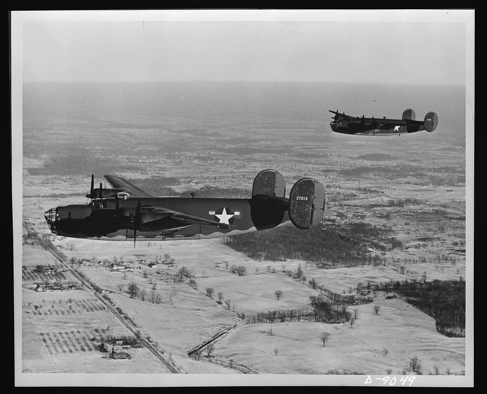 Liberator (B-24E) bomber. Two Liberator (B-24E) bombers on trial flights near the big Ford Willow Run Plant at which they…