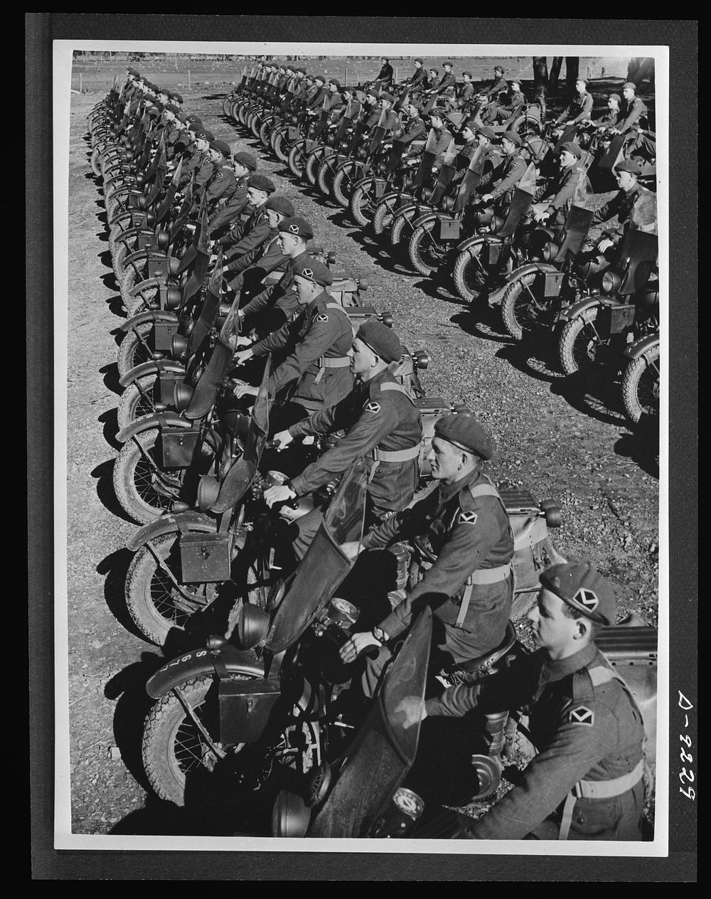 Australia in the war. Dispatch riders of an Australian armored division lined up for review. These are American motorcycles…