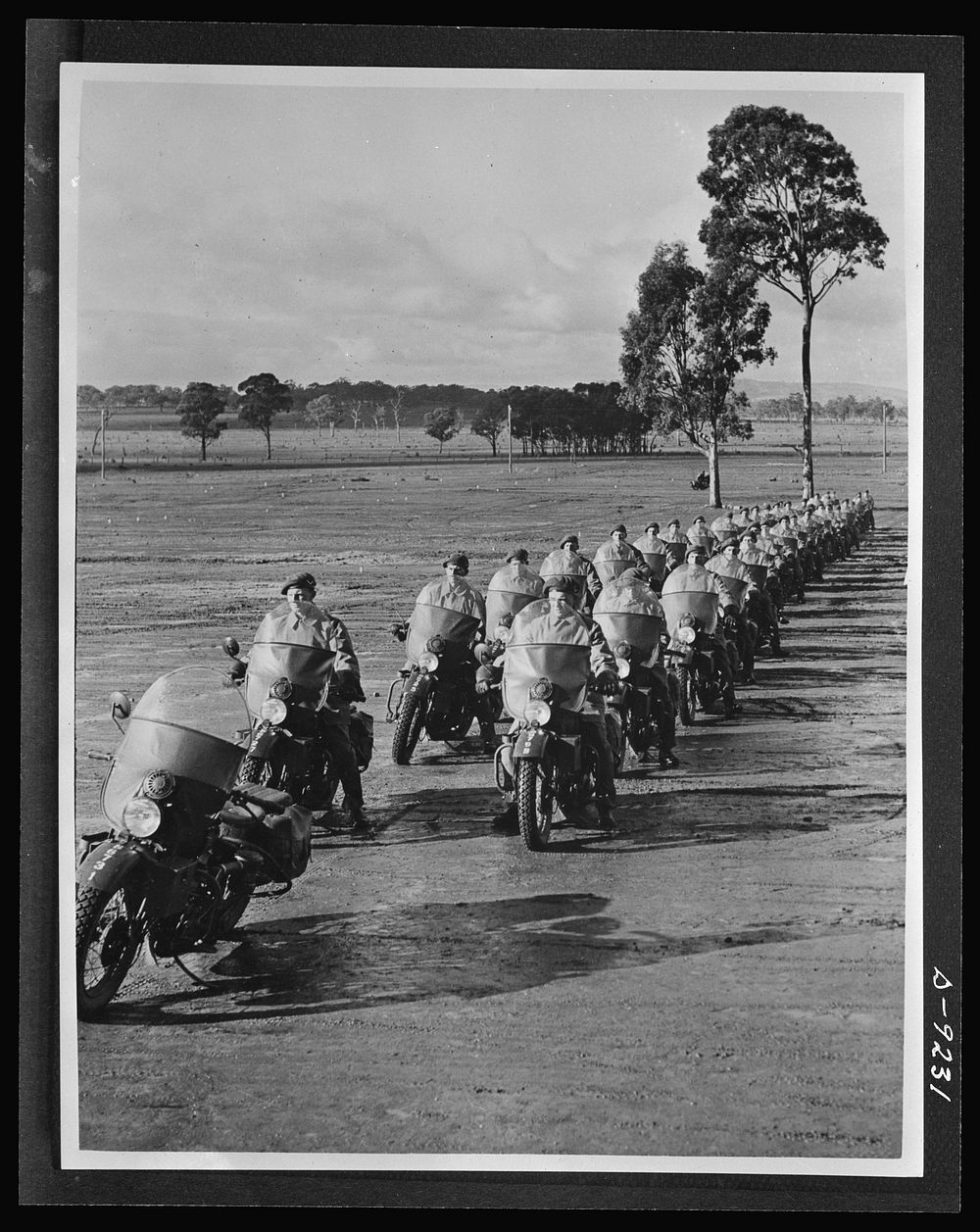 Australia in the war. American motorcycles, furnished under lend-lease, are used in this formation of Australian cyclists…