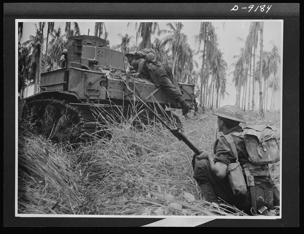 Troops in Australia. An American light tank, manned by an Australian crew, smashed through Japanese pillboxes in the final…