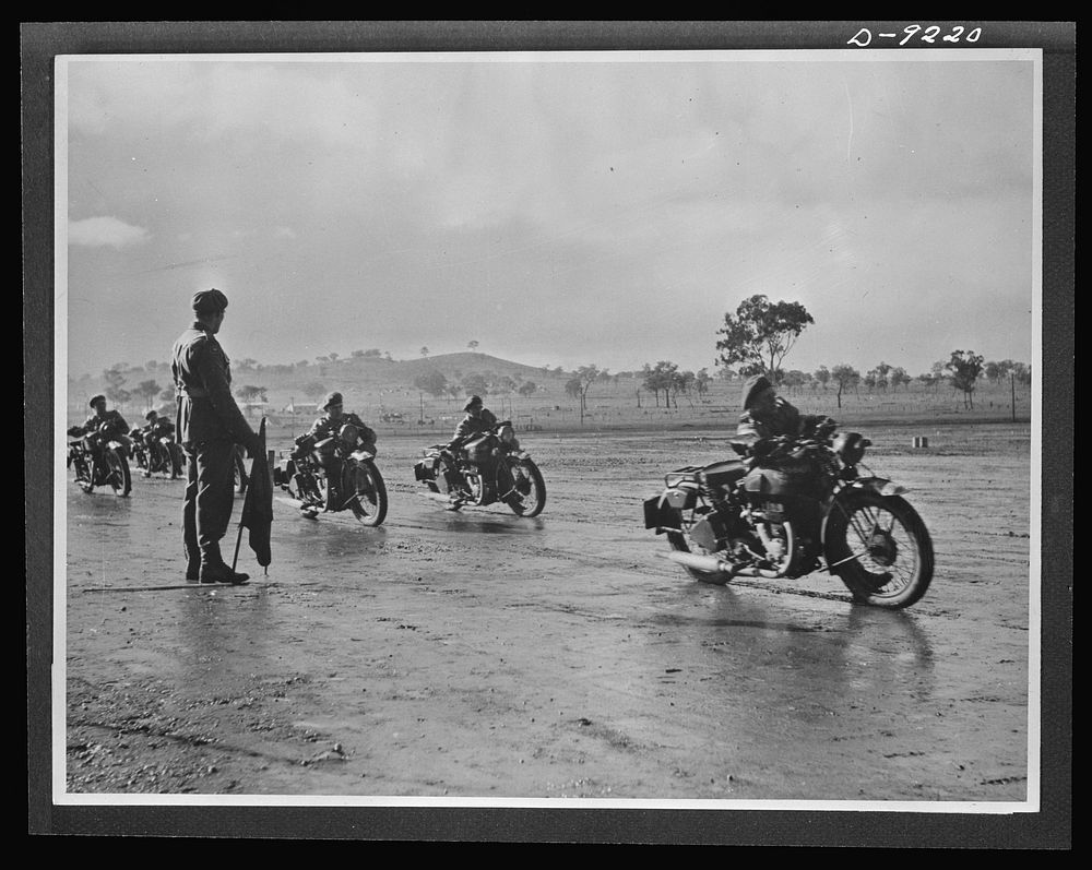 Australia in the war. Australian dispatch riders, equipped with American motorcycles, stage a demonstration during a review…