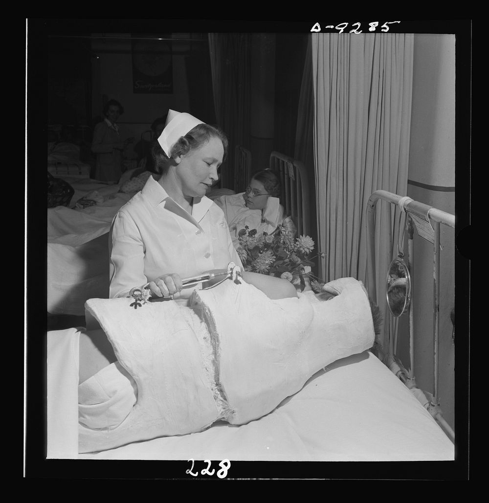 Nurse training. When student nurses have completed much of their training they can relieve nurses such as this one for war…