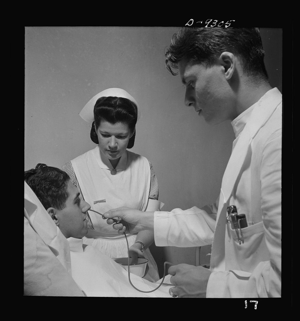 Nurse training. A student nurse aides the doctor in a gastric analysis. Sourced from the Library of Congress.