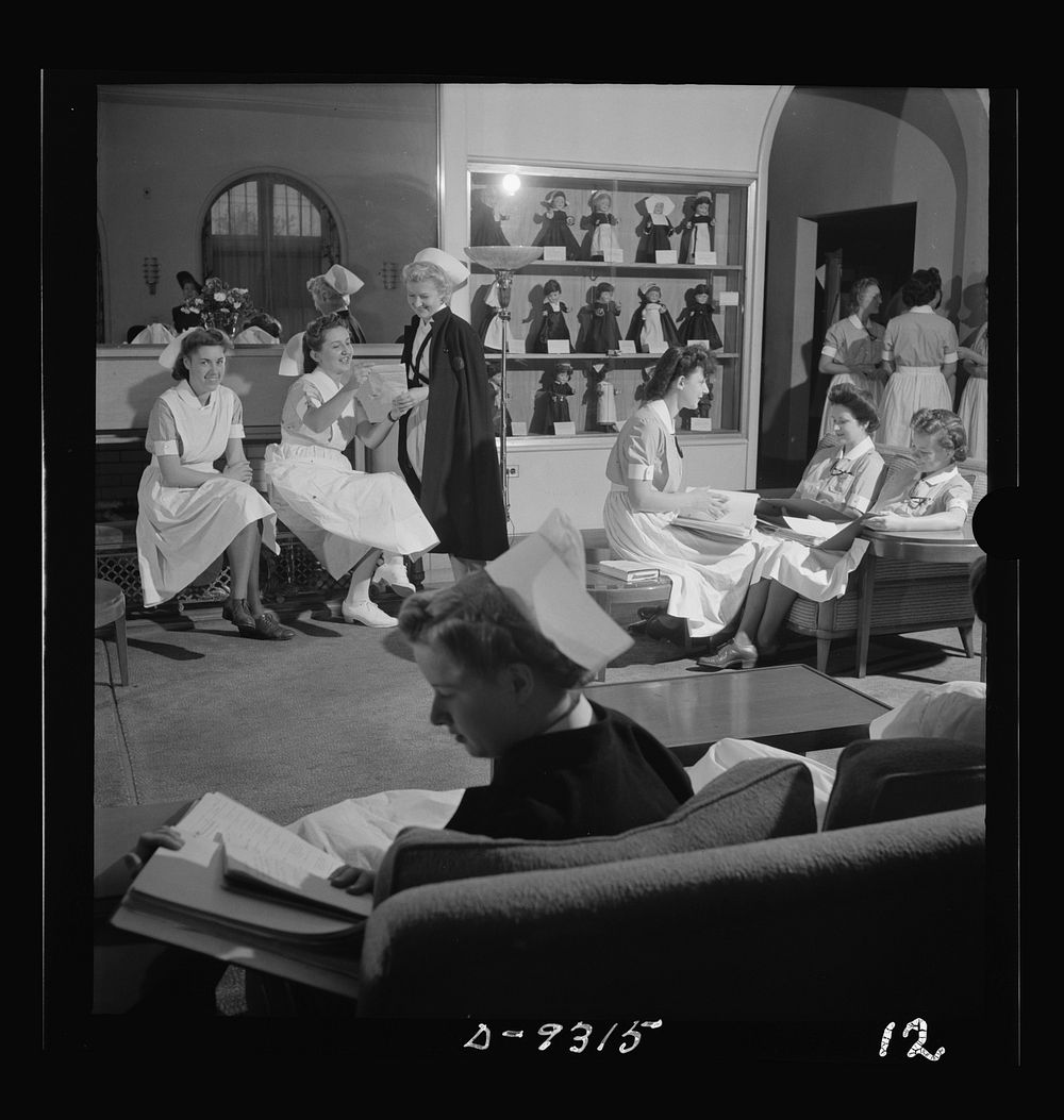 Nurse training. A moment's pause in a full day, as graduate student nurses relax in the living room of the nurse's home.…