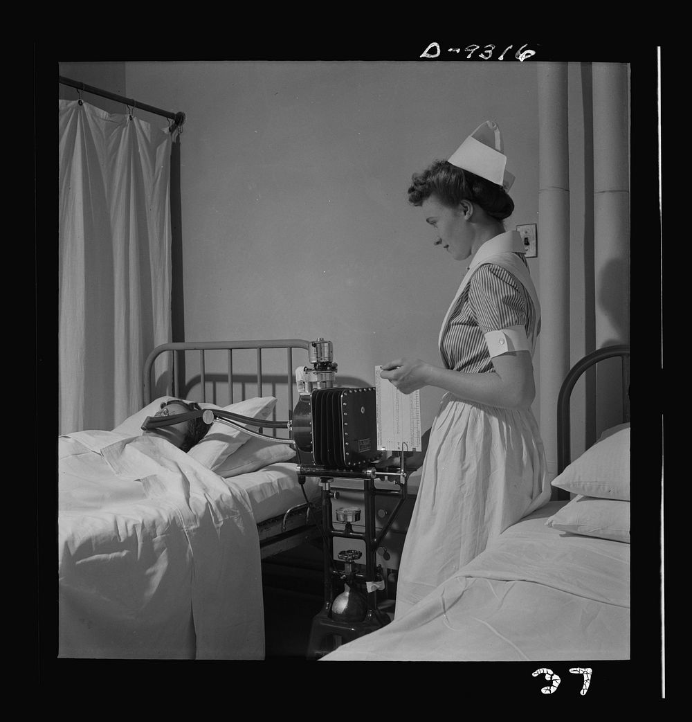 Nurse training. A student nurse gives a patient a metabolism test. Sourced from the Library of Congress.