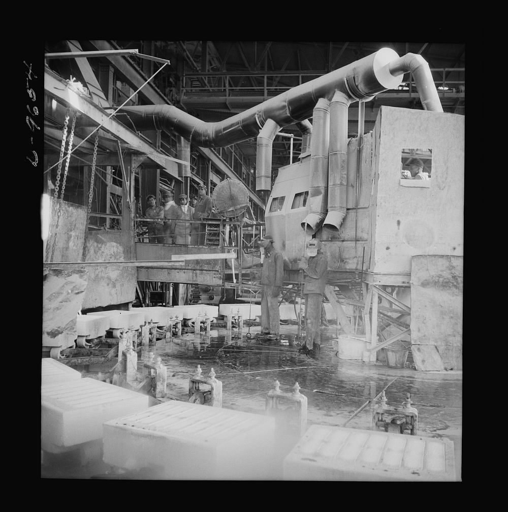 Production. Copper (refining). Casting house in a large copper refining operation. Here sheets of pure copper, formed by…