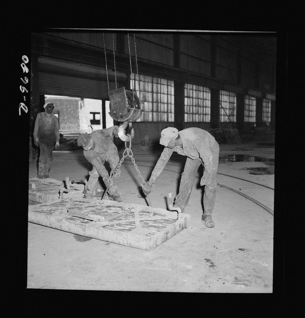 Production. Copper (refining). Handling a fire door for a furnace at a large copper refining operation. Large amounts of…