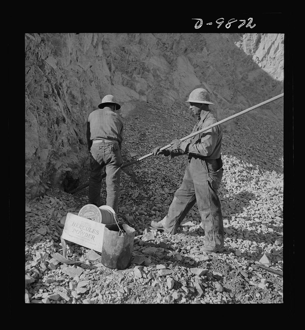 Utah Copper: Bingham Mine. Tamping a blasting charge at the open-pit mining operations of Utah Copper Company, at Bingham…